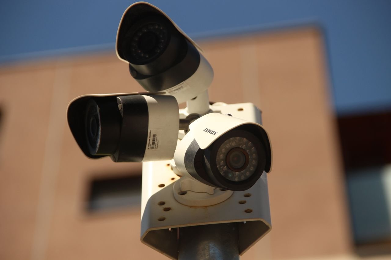 About High-resolution surveillance cameras installed in a city environment for security purposes.